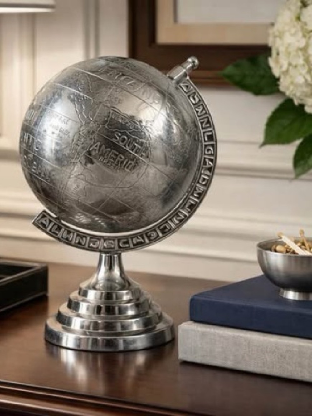 Rotating silver tabletop globe | 10”